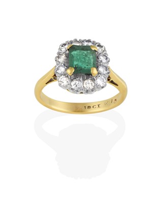 Lot 2376 - An Emerald and Diamond Cluster Ring