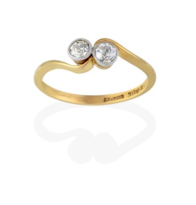 Lot 2310 - A Diamond Two Stone Twist Ring