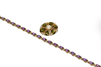 Lot 264 - A 9 carat gold peridot and cultured pearl...