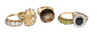 Lot 265 - A smoky quartz ring, stamped '18CT', finger...