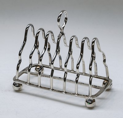 Lot 96 - A George V Silver Toastrack, by Martin and...