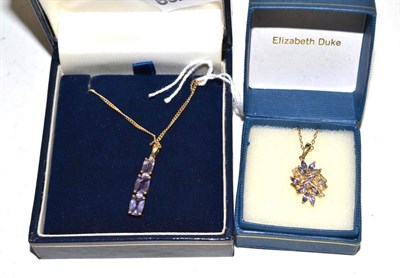 Lot 271 - A tanzanite and diamond on chain and another