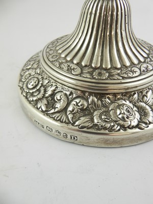 Lot 2008 - A Pair of George III Silver Candlesticks