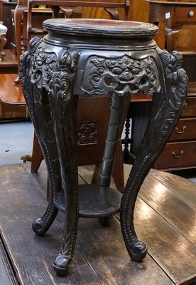 Lot 1187 - A 19th century Chinese jardiniere stand, 55cm...