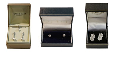 Lot 288 - A pair of 9 carat white gold diamond and...