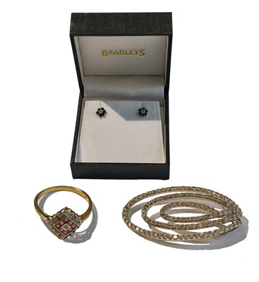 Lot 281 - An 18 carat gold diamond solitaire pendant; a...