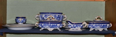 Lot 275 - 19th century blue and white Willow pattern dinner service comprising three graduating meat...