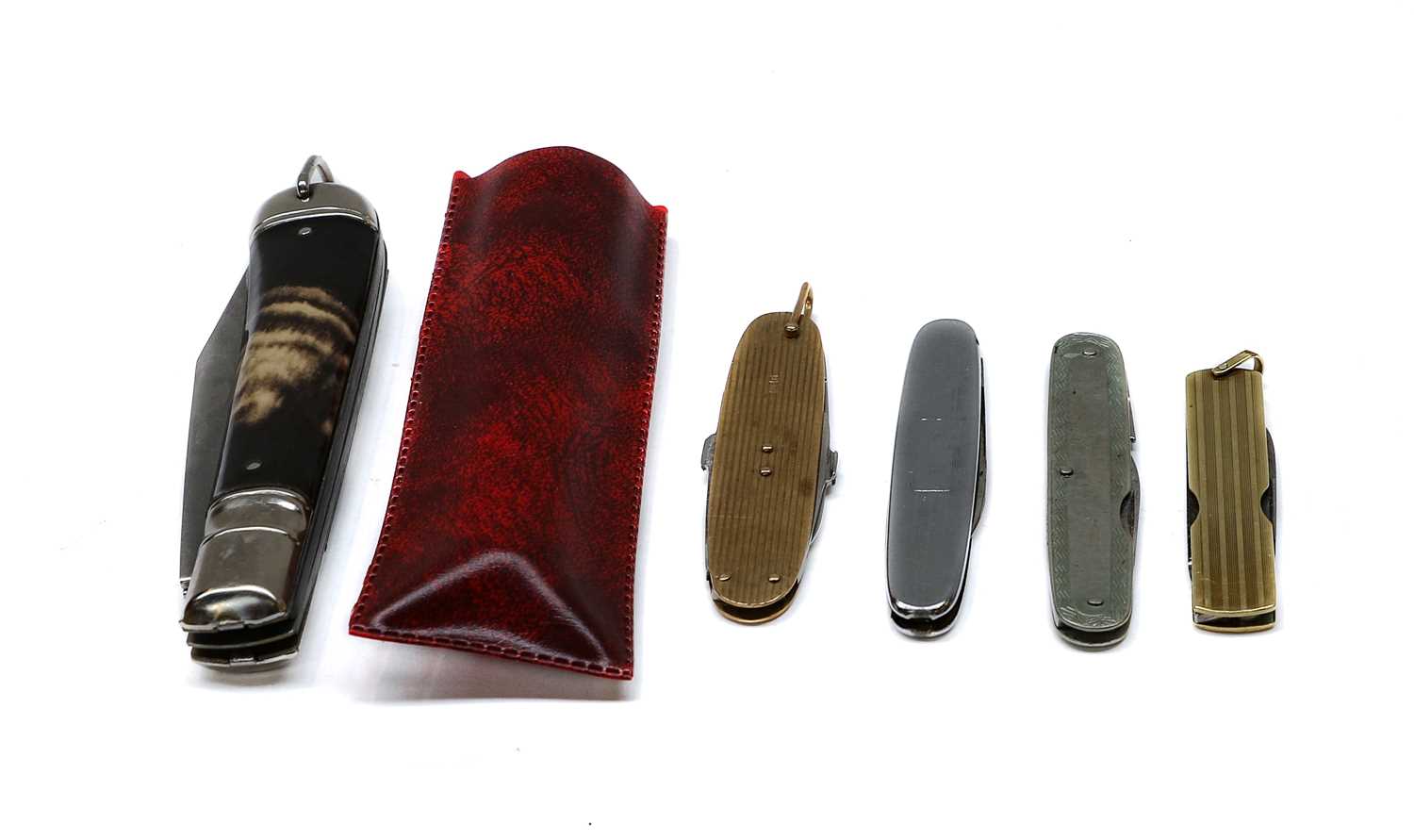 Lot 118 - A 9ct Gold Pocket-Knife; a further...