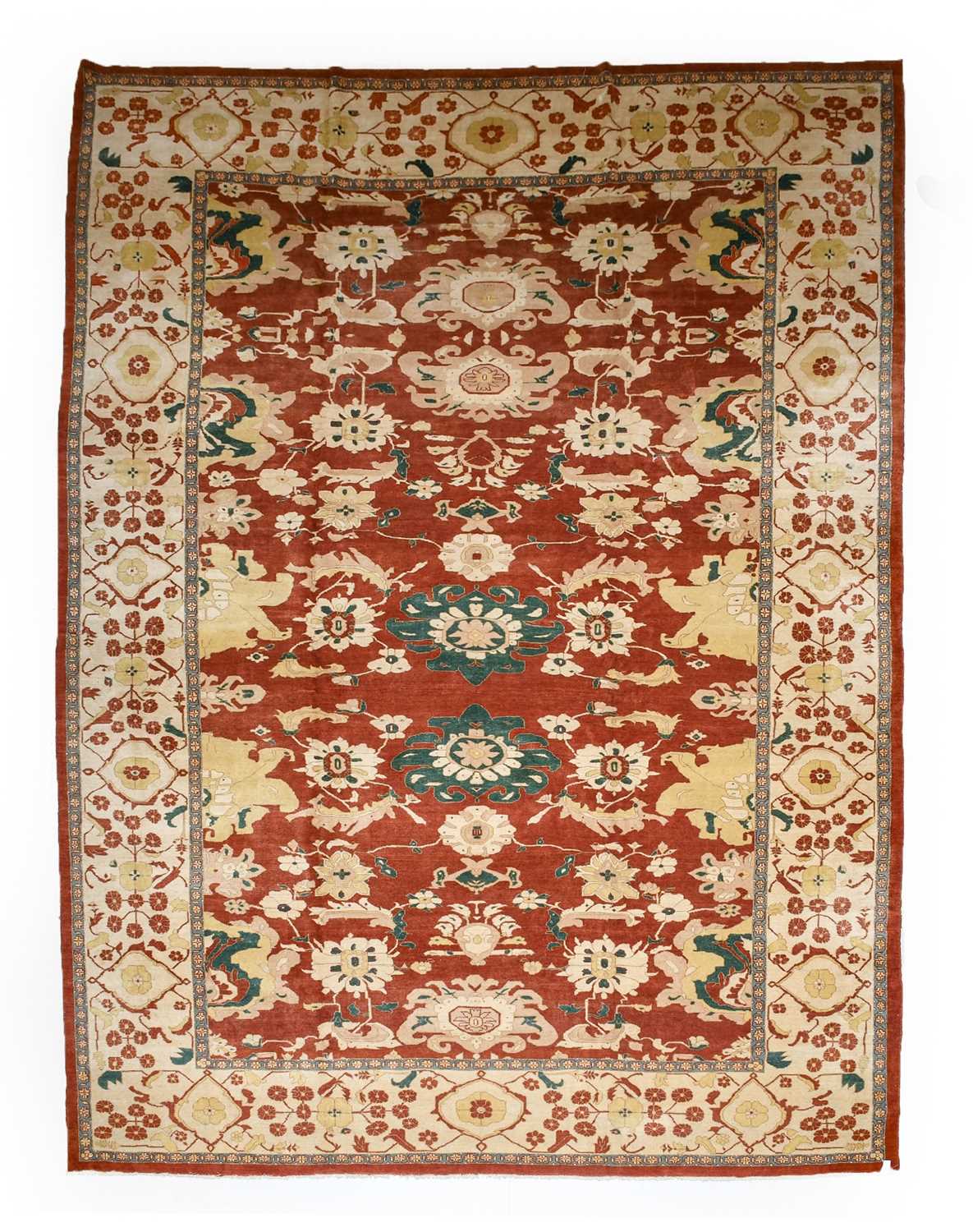 Lot 585 - Ziegler Design Carpet, modern The brick red...