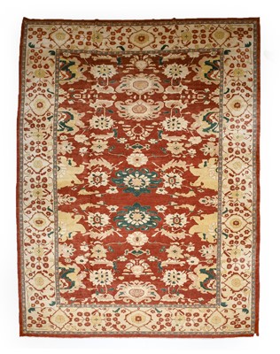 Lot 585 - Ziegler Design Carpet, modern The brick red...