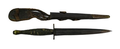 Lot 3183 - A Second World War Commando Knife, with 17.5cm...