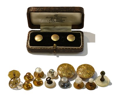Lot 292 - Three 15 carat gold dress studs, cased; two 18...