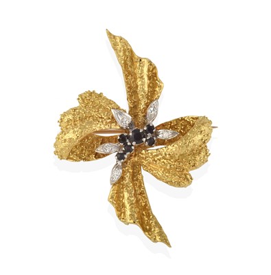 Lot 2382 - An 18 Carat Gold Sapphire and Diamond Brooch