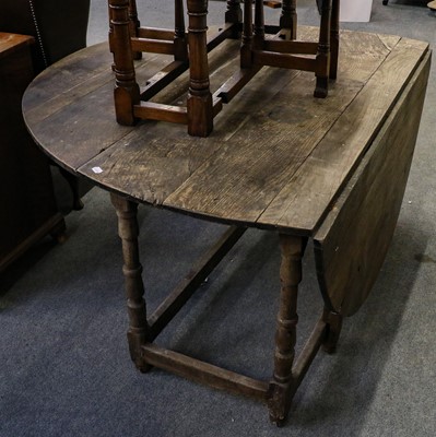 Lot 1227 - An early 18th century oak gateleg table, 172cm...