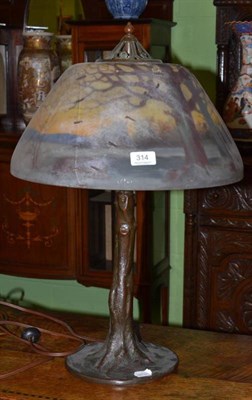 Lot 314 - An Art Nouveau American Handel boudoir lamp, obverse painted snow landscape glass shade, on a...