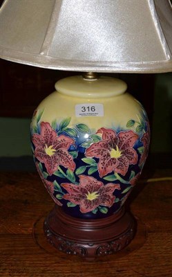 Lot 316 - Moorcroft pottery floral decorated table lamp and shade