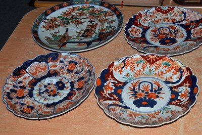 Lot 319 - Three Imari scallop edged plates and a charger (4)