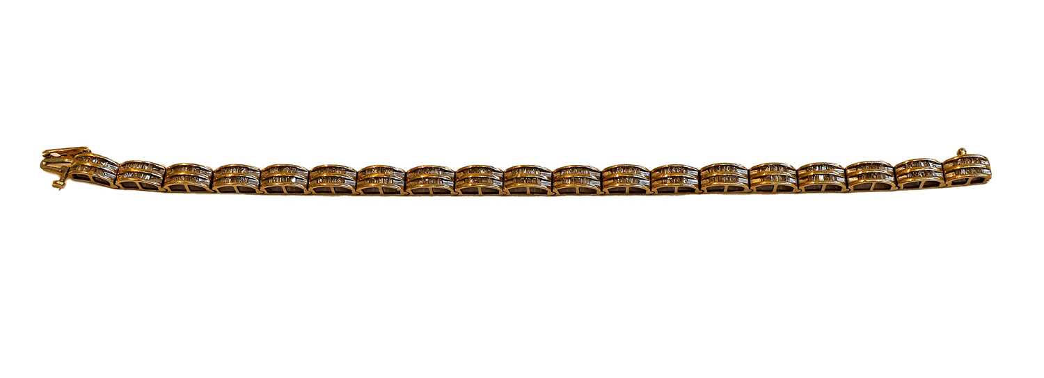 Lot 134 - A diamond bracelet, stamped '10K', length 18cm