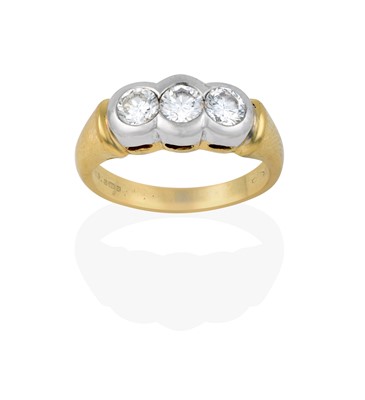 Lot 2349 - An 18 Carat Gold Diamond Three Stone Ring