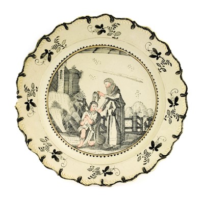 Lot 35 - A Dutch Decorated Creamware Plate, circa 1780,...