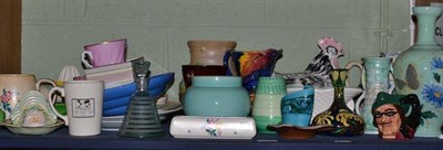 Lot 331 - A shelf of assorted decorative pottery including Maling, Poole, Carltonware, Royal Doulton,...