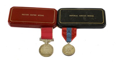 Lot 3033 - A British Empire Medal and an Imperial Service...