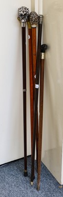 Lot 354 - A Collection of Five Various Walking Sticks,...