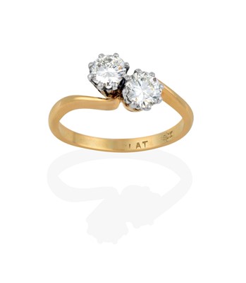 Lot 2331 - A Diamond Two Stone Twist Ring