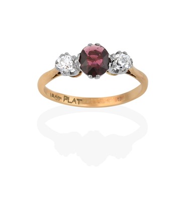 Lot 2299 - A Ruby and Diamond Three Stone Ring