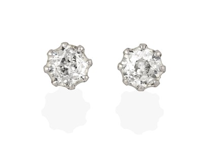 Lot 2413 - A Pair of Diamond Solitaire Earrings