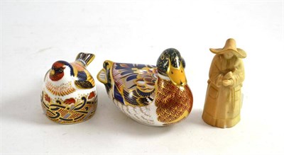 Lot 341 - A Royal Worcester candle snuffer, two Royal Crown Derby paperweights - duck and a goldfinch nesting