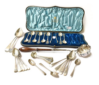 Lot 24 - A collection of silver flatware, including: a...