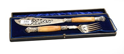 Lot 340 - A pair of Victorian ivory handled fish servers...