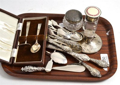 Lot 350 - Silver inkwell, silver mounted toilet jars, silver handled buttons hooks, silver teaspoons and...