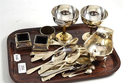 Lot 354 - A pair of champagne cups, sauce boat, silver tea spoons and a pair of salts