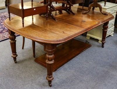 Lot 1251 - A Victorian mahogany wind out dining table,...