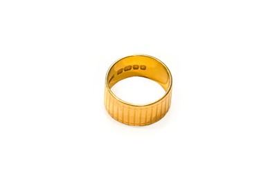 Lot 186 - A 22 carat gold band ring, finger size K1/2