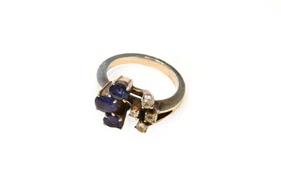 Lot 203 - A sapphire and diamond ring, unmarked, finger...