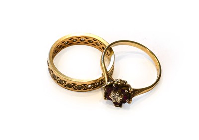 Lot 263a - A 9 carat gold diamond and red stone cluster...
