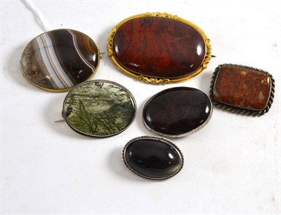 Lot 368 - Six hardstone brooches including moss agate, sardonyx, etc