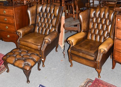 Lot 1217 - A near pair of olive leather buttoned...