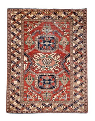 Lot 554 - Afghan Carpet, modern The shaded strawberry...
