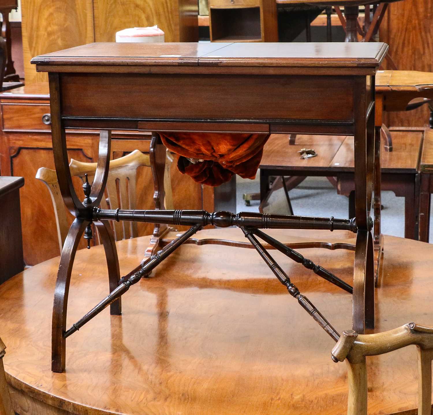 Lot 1182 - An Edwardian combination work table and desk,...