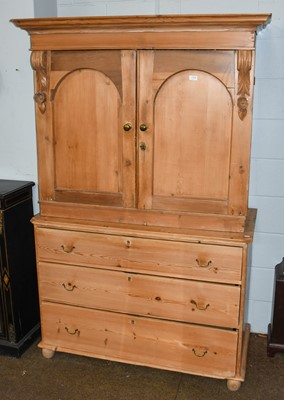 Lot 1308 - A pine kitchen press cupboard and associated base