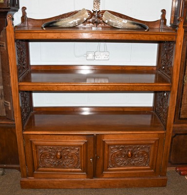 Lot 1333 - An early 20th century mahogany three-tier...