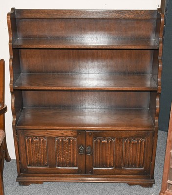 Lot 1414 - A 1920's linen fold carved oak waterfall...