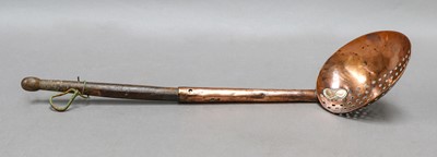 Lot 200 - An 18th century food strainer spoon with...