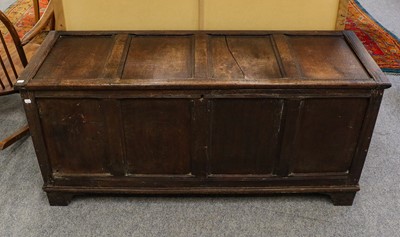 Lot 1420 - An 18th century oak four panel coffer, 142cm...