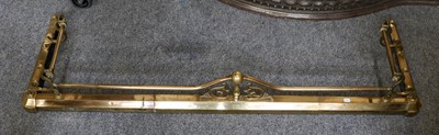 Lot 1265 - An early 20th century brass fender, 161cm by...