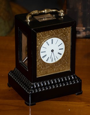 Lot 374 - An ebonised striking mantel clock, circa 1850,...